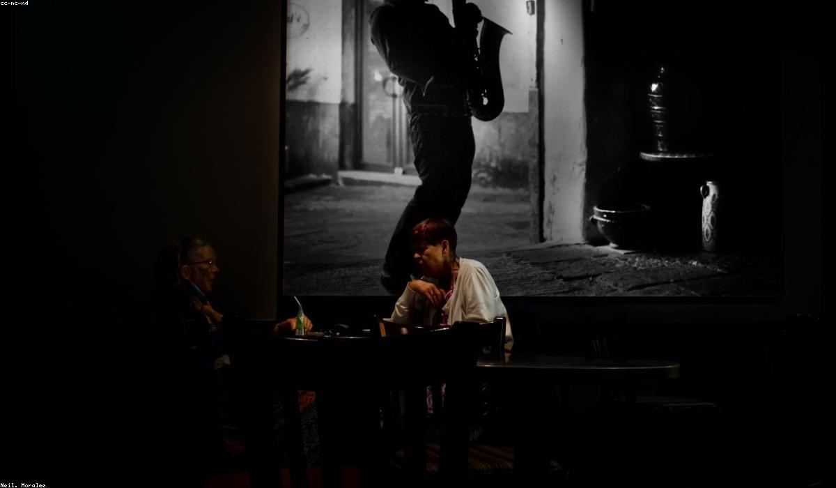 a couple having a close conversation over coffee